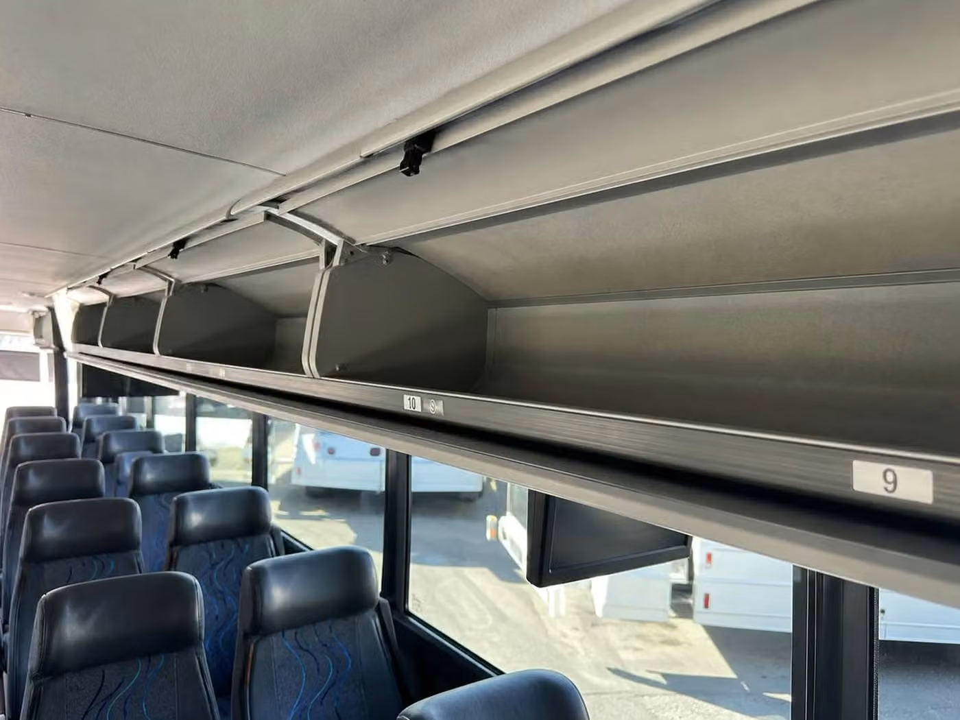 davenport 56 passenger charter bus overhead storage
